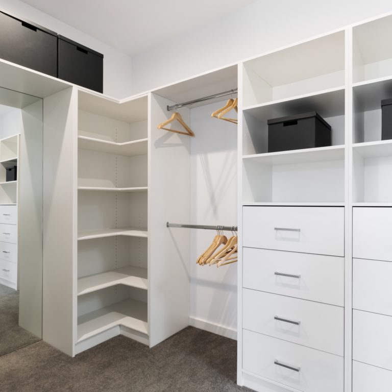 Large walk in wardrobe cabinetry detail in new home